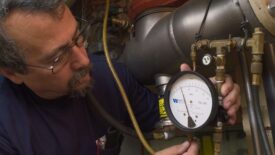 Dave Yates performs backflow testing