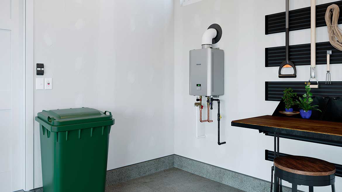 RE Series tankless water heater in garage.