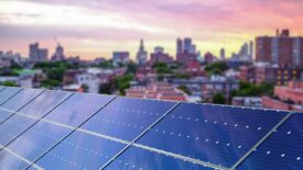 PME John Siegenthaler Column. Solar panel closeup skyline background