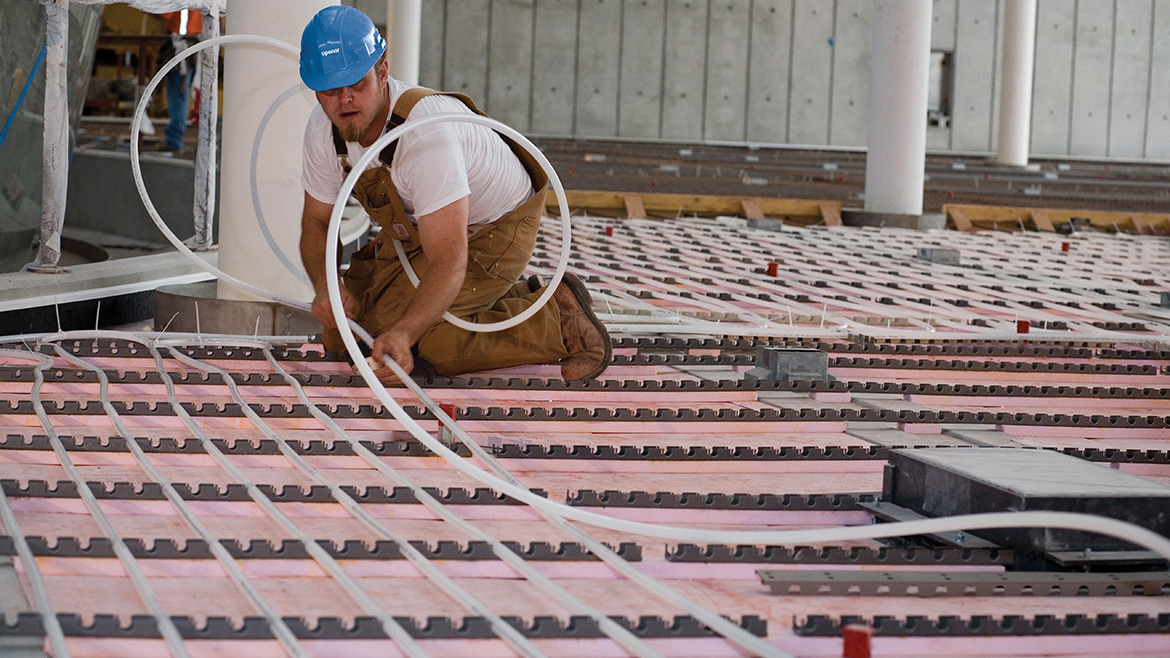 Worker installing PEX