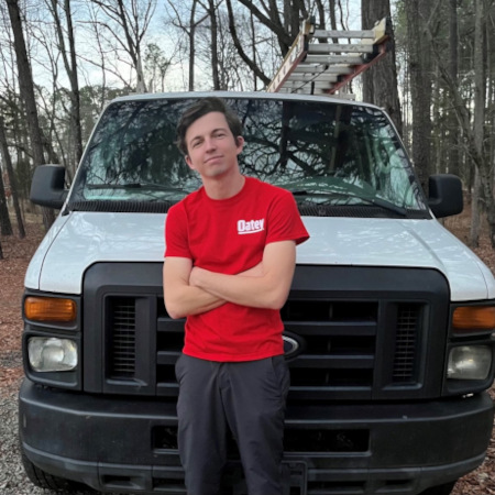 Tucker Baney posing with his truck.jpg