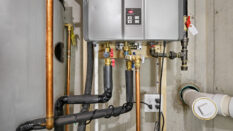 Tankless water heater connected to recirculator.