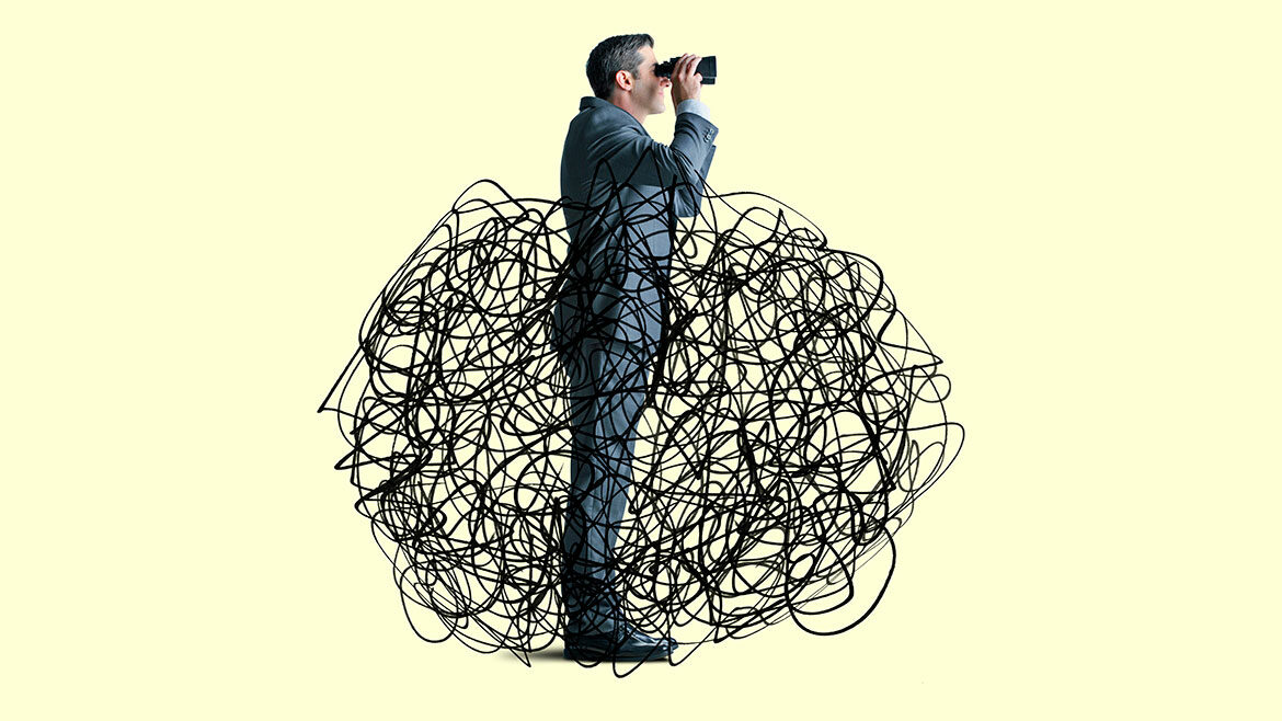 A businessman standing amidst the confusion of a cloud of scribbled lines pokes his head above the cloud as he looks ahead through a pair of binoculars and searches for clarity.