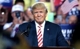 Donald Trump speaks with supporters at a campaign rally at the Prescott Valley Event Center in Prescott Valley, Ariz.